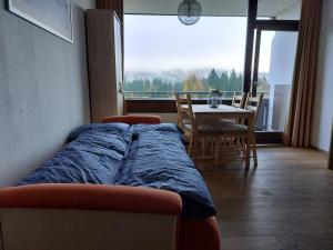 Posedenie v ubytovaní Wohnung in Bad Goisern + 12 fotografií