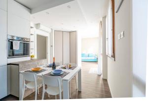 Kuchyň nebo kuchyňský kout v ubytování Appartamento Villa Martinoni