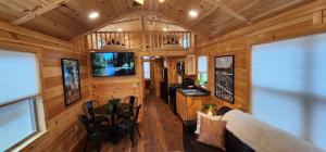 a living room and kitchen in a tiny house at Blue Buffalo Resort in Island Park