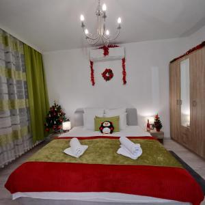 Posteľ alebo postele v izbe v ubytovaní Corner Apartment + 22 fotografií