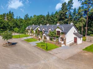 an aerial view of a large house with a driveway at Family Lodge No, 2 The Place Downstairs - Uk45691 in Pitlochry