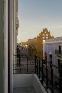 a view of a city street from a building at Narrativ Lofts - Numen - Stylish Hideaway in Campeche