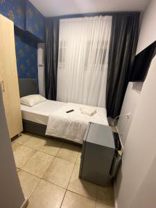 Postel nebo postele na pokoji v ubytování Safir Hotels Çorlu
