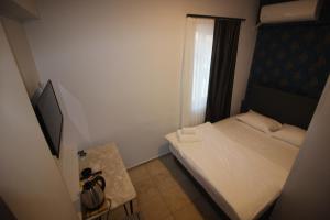 Postel nebo postele na pokoji v ubytování Safir Hotels Çorlu