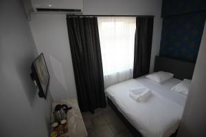 Postel nebo postele na pokoji v ubytování Safir Hotels Çorlu