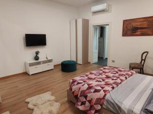 Postel nebo postele na pokoji v ubytování Appartamenti Lungo Fiume