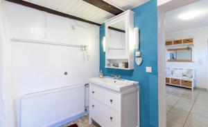 Koupelna v ubytování Uwe's Huus + 13 fotografií