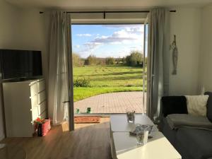 Posezení v ubytování Schwedenhaus Idyll + 9 fotografií