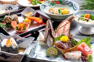 a tray of food with a variety of different foods at Atagawakan in Higashiizu