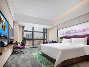 Een TV en/of entertainmentcenter bij Hampton by Hilton Shenzhen Baoan Stadium
