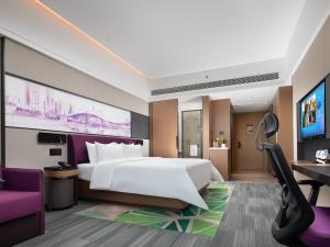 Een TV en/of entertainmentcenter bij Hampton by Hilton Shenzhen Baoan Stadium
