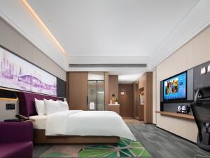 Een TV en/of entertainmentcenter bij Hampton by Hilton Shenzhen Baoan Stadium
