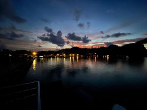 a view of a body of water at night at Koh Mook Bungalows in Koh Mook