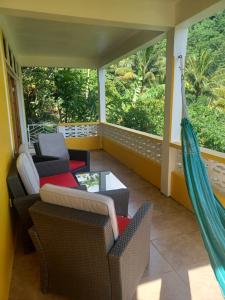 Area soggiorno di Mango Garden Cottages