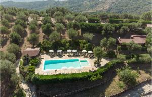 an aerial view of a resort with a swimming pool at Pet Friendly Home In Stella Cilento With House A Panoramic View in Stella Cilento