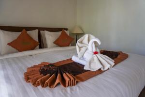 Postel nebo postele na pokoji v ubytování Arya Resort Nusa Penida