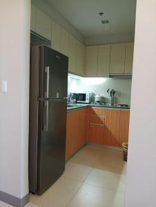 Küche/Küchenzeile in der Unterkunft Mactan Newtown Condo by EJB