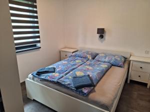 Posteľ alebo postele v izbe v ubytovaní MB APARTMÁNY LIPNO