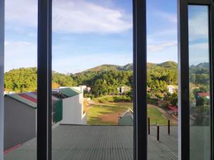 a view from the window of a house at ĐỒNG TÂM HOTEL in Bắc Yên