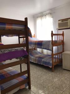 Postel nebo postele na pokoji v ubytování Grande Apartamento Quadra Mar