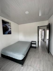 Postel nebo postele na pokoji v ubytování Alojamiento en Neiva