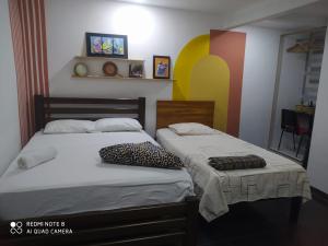 Uma cama ou camas num quarto em Casa Turistica Zamboss