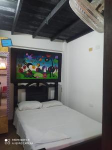 Uma cama ou camas num quarto em Casa Turistica Zamboss