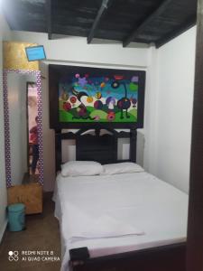 Uma cama ou camas num quarto em Casa Turistica Zamboss
