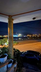 a car parked in a parking lot at night at Thanh Ha Hotel in Chơ Mơi