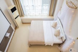 Postel nebo postele na pokoji v ubytování Lavender Apartment Branch