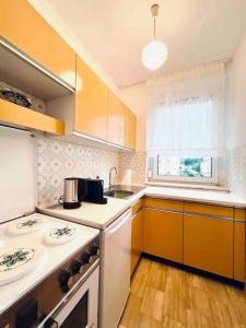 Kuchyňa alebo kuchynka v ubytovaní Ferienwohnung zum Wohlfühlen + 4 fotografie