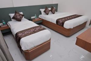 Letto o letti in una camera di Hotel D Square