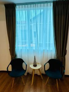 Posezení v ubytování LESTARI INN RESIDENCE