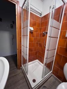 Koupelna v ubytování da Robi appartamento fronte piste