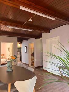 a dining room with a table and chairs at Timeless Hanok In Jamsil Serenity in Seoul