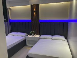 Letto o letti in una camera di Central Block Inn