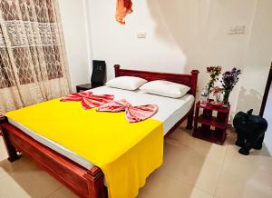 Postel nebo postele na pokoji v ubytování Golden Town Hostel