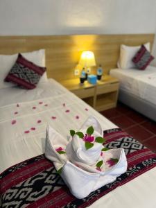 Voodi või voodid majutusasutuse Seaside Hotel toas