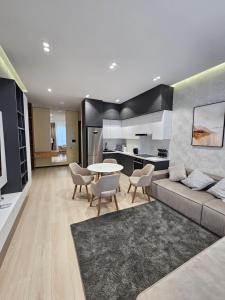 Kuchyň nebo kuchyňský kout v ubytování Magnificent apartment in NRG Oybek + 8 fotografií
