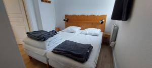 Postel nebo postele na pokoji v ubytování Appartement 4/6 personnes - Vue plein sud - Chamrousse