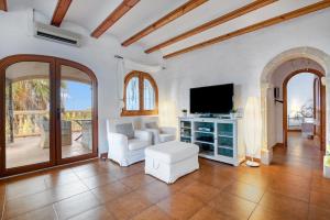 TV/trung tâm giải trí tại Villa Lau Costa Blanca