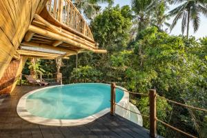 Bazén v ubytování Jungleight Bali nebo v jeho okolí