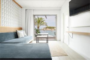 TV a/nebo společenská místnost v ubytování Hotel Marina