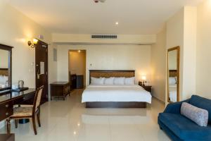 Katil atau katil-katil dalam bilik di Black Diamond Hotel