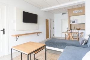 TV a/nebo společenská místnost v ubytování Hotel Marina