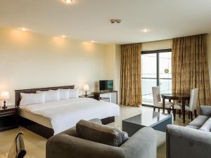 Katil atau katil-katil dalam bilik di Black Diamond Hotel