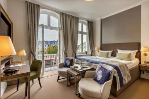 Postel nebo postele na pokoji v ubytování Hotel Am Leuchtturm