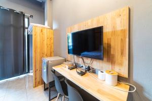 TV a/nebo společenská místnost v ubytování Joox B - Serviced Apartment