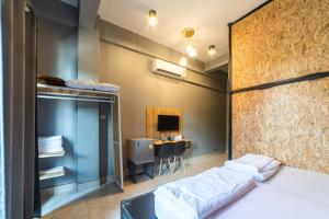 Postel nebo postele na pokoji v ubytování Joox B - Serviced Apartment
