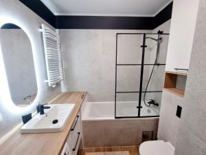 Phòng tắm tại DOKI Living Apartament 55